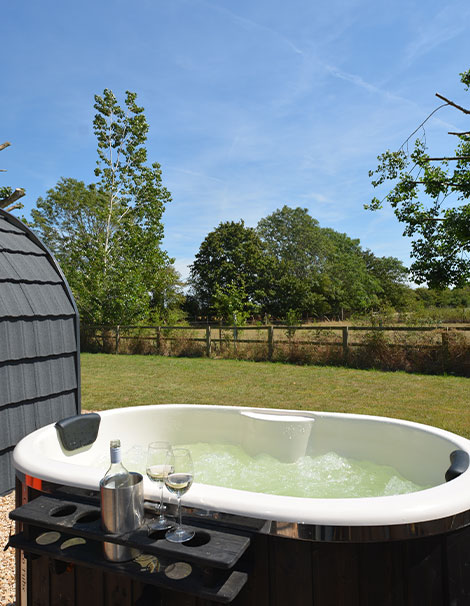Wood-fired hot tubs at Manor Farm B&B Kelmscott